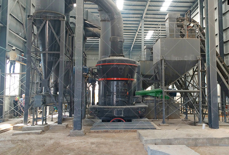 Technician performing quality control check on finished phosphate powder